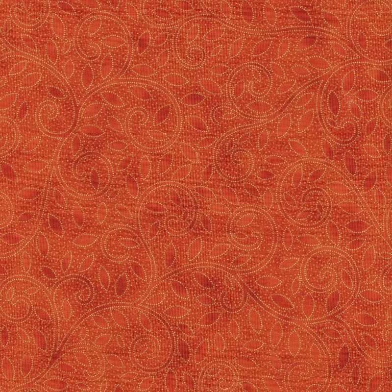 Oransje med gullsnirkler